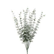 Bouquet of artificial eucalyptus branches on a white background