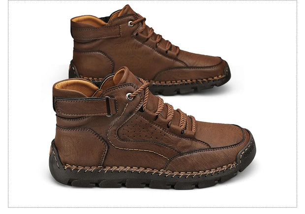 Brown leather boots with black soles on a white background