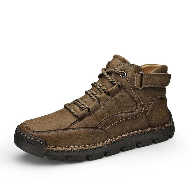 Brown leather boot with visible branding on a white background