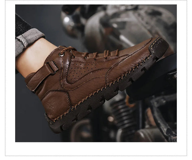 Brown leather boot on a motorcycle with a blurred background