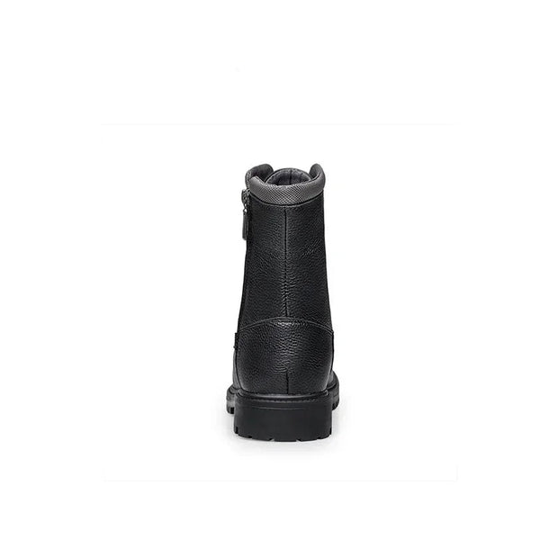 Black leather boot on a white background