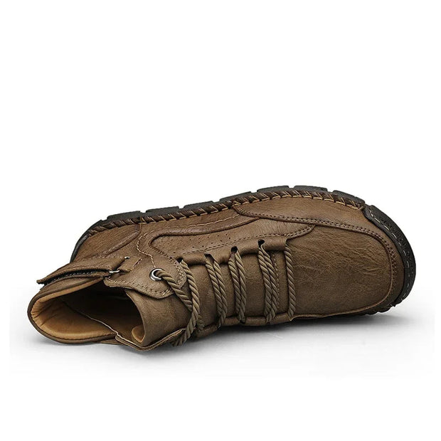 Brown leather boot with braided laces on a white background