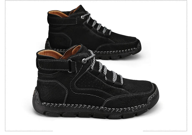 Black high-top boots with white laces on a white background