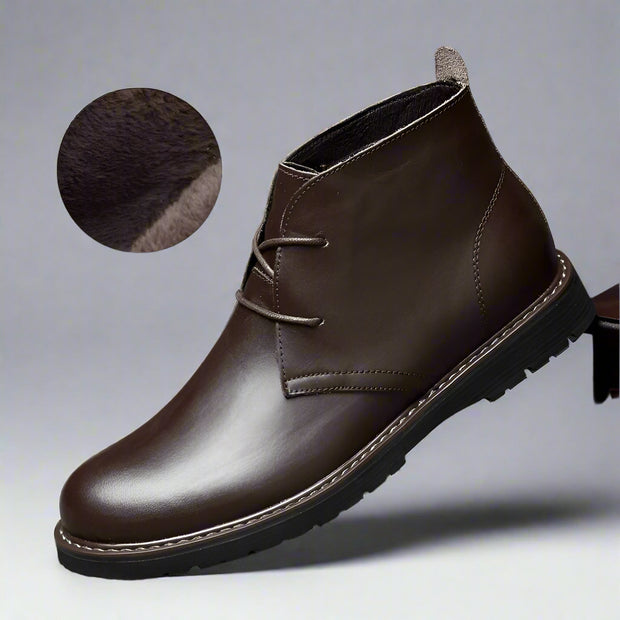 Brown leather shoe with fur lining on a textured surface