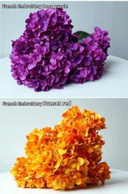 Two images of flowers labeled 'French Embroidery Deep purple' and 'French Embroidery Sunset red' on a white background.