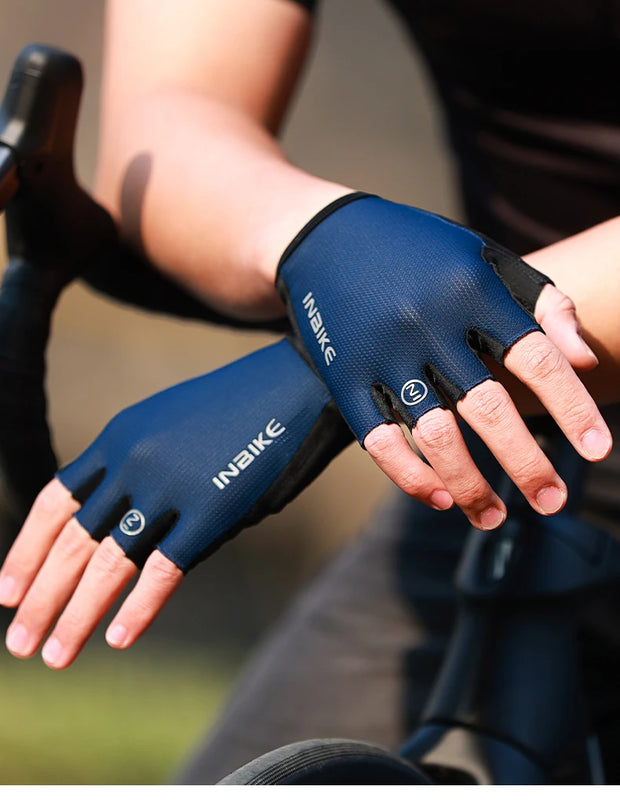 Blue cycling gloves on a blurred background