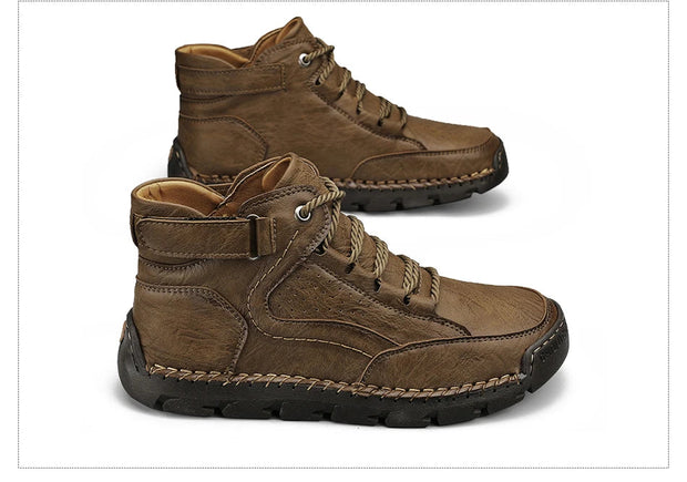 Pair of brown leather boots on a white background