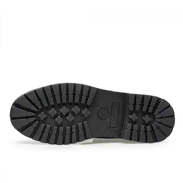 Black sole of a shoe on a white background