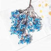 Bouquet of blue flowers on a white background with text