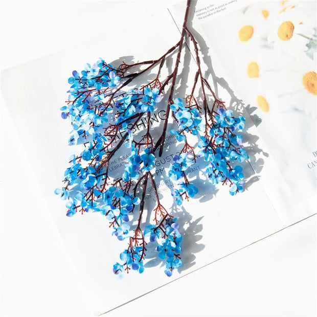 Bouquet of blue flowers on a white background with text