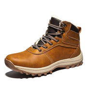 Brown hiking boot with white sole on a white background