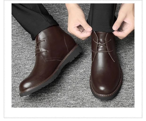 Brown leather shoes being worn on a gray textured surface
