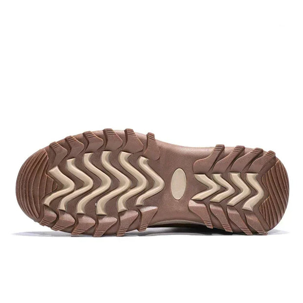 Brown shoe sole with zigzag pattern on a white background