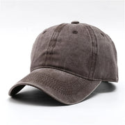 Brown baseball cap on a white background