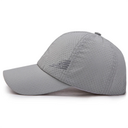 Gray baseball cap with perforated design on a white background