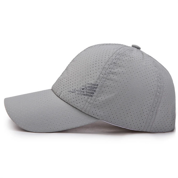 Gray baseball cap with perforated design on a white background