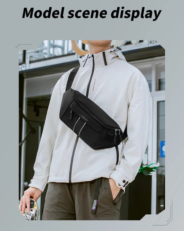 Person wearing a white jacket with a black crossbody bag in an urban setting