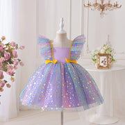 Colorful fairy dress on a mannequin against a white background with decorative elements.