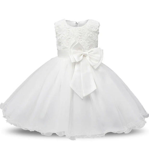White lace dress with a large bow on a white background