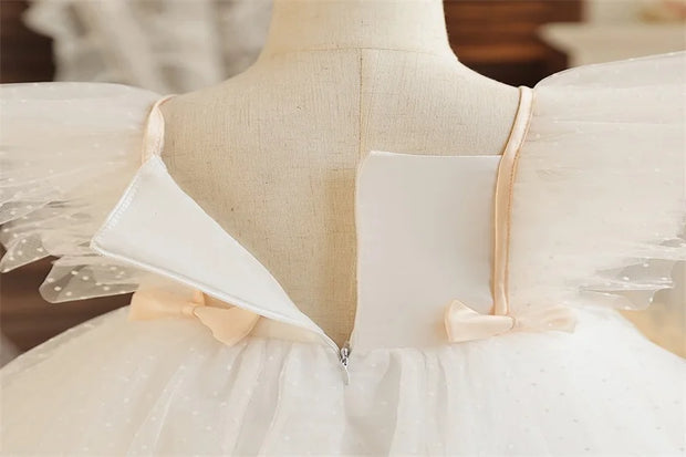 White wedding dress on a mannequin with a blurred background
