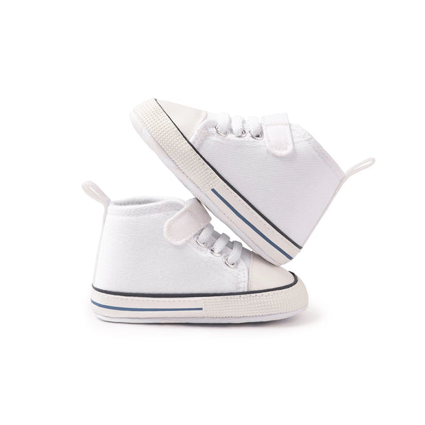 White high-top sneakers with blue accents on a white background