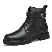 Black leather boot with a strap and buckle on a white background