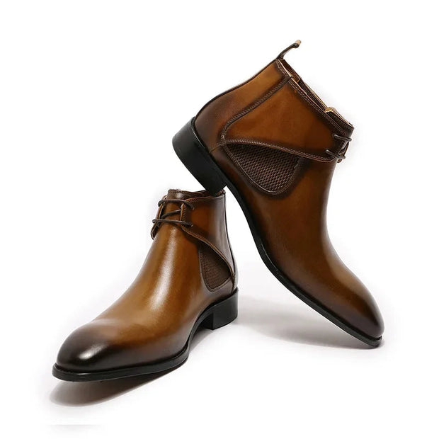 Brown leather boots on a white background