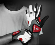 Person wearing red and black gloves on a dark background