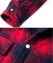 Close-up of a red and blue plaid shirt with buttons