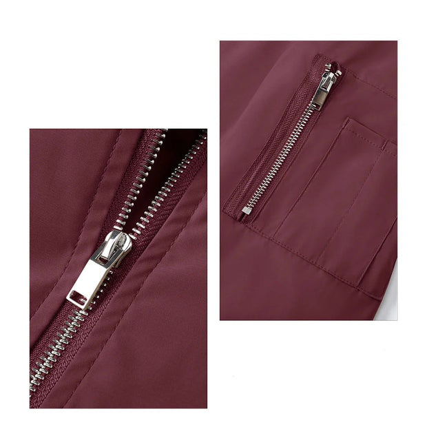Maroon windbreaker jacket with zipper and sleeve pocket