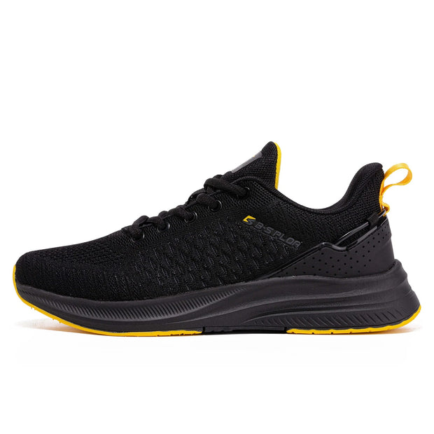 Black running shoe with yellow accents on a white background