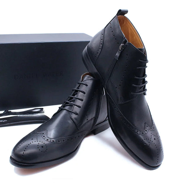 Black leather shoes with laces on a white background