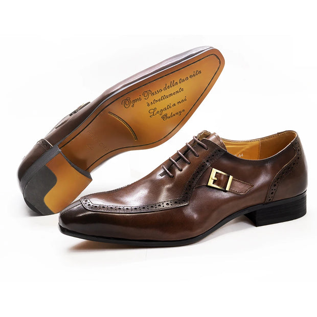 Brown leather dress shoes with a gold buckle on a white background
