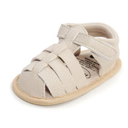 Beige sandal with multiple straps on a white background