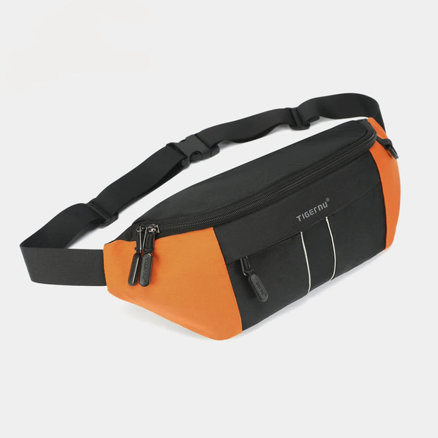 Black and orange waist bag on a light gray background