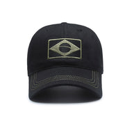 Black cap with a gold logo on a white background