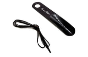 Black hair straightener with a cord on a white background