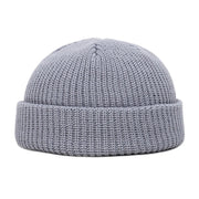 Gray knit beanie on a white background