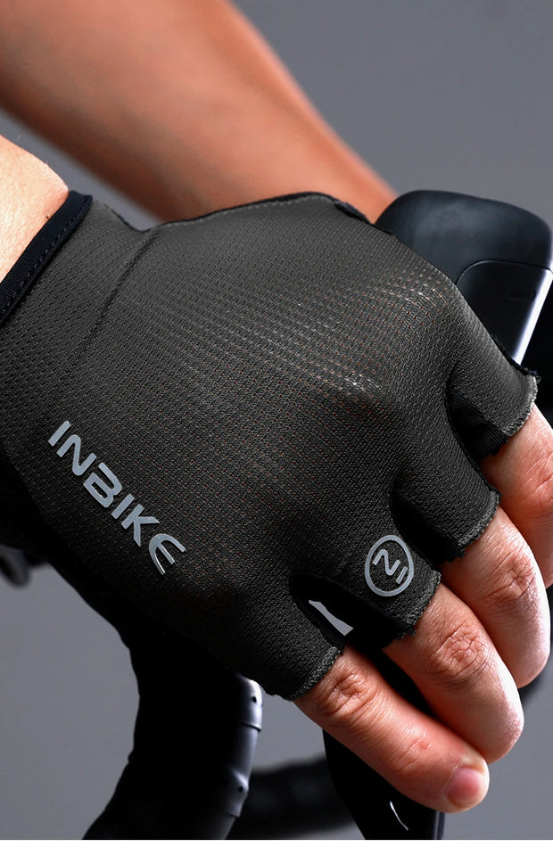 Black cycling glove on a blurred background