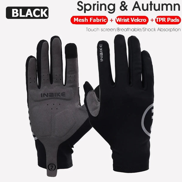 Black gloves with mesh fabric, wrist velcro, and TPR pads on a white background