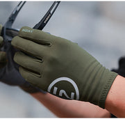 Green glove on a blurred background