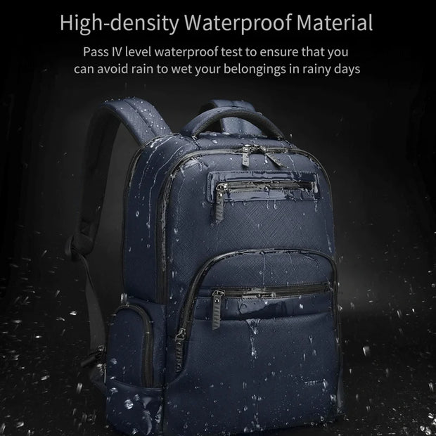 Blue backpack with water droplets on a dark background, emphasizing waterproof material.