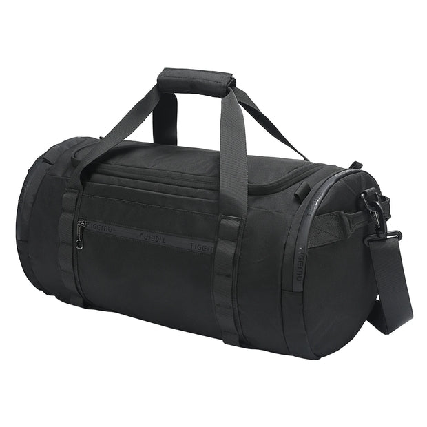 Black duffel bag with straps on a white background