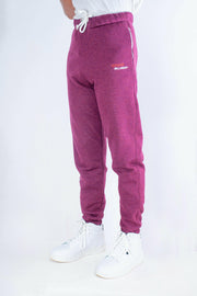 Purple sweatpants with a brand logo on a white background