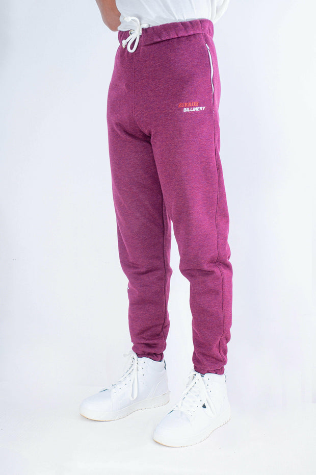 Purple sweatpants with a brand logo on a white background