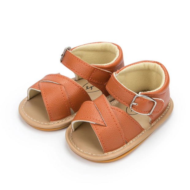 Flower Accent Baby Sandals – PU Leather Soft Sole Anti-Slip First Walkers (0–12 Months) Baby Sandals ZURRIES BILLINERY (PVT) LTD.
