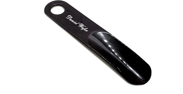 Black metal tool with 'Duncan Weigh' branding on a white background