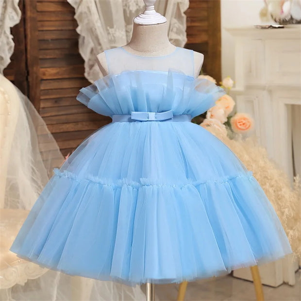 Light blue tulle dress on a mannequin against a neutral background