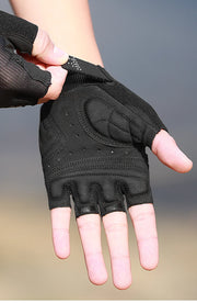 Black half-finger glove on a blurred background