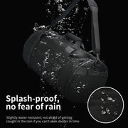 Black duffel bag with water splashes and text indicating splash-proof feature